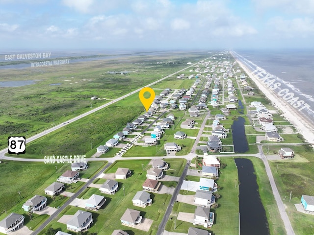 3229 Castle Dr, Crystal Beach, TX 77650 - aerial overview of property's location featuring a large body of water
