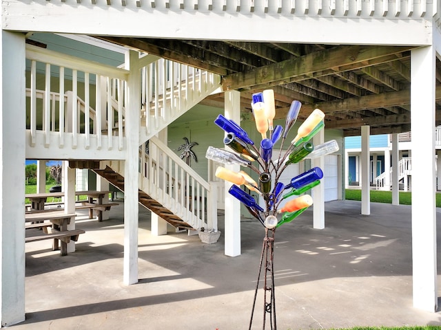 3229 Castle Dr, Crystal Beach, TX 77650 - view of patio / terrace featuring stairs