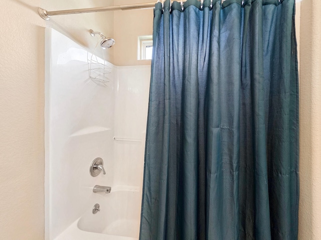 3229 Castle Dr, Crystal Beach, TX 77650 - bathroom featuring shower / tub combo