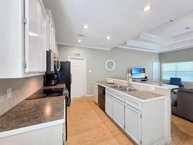 3229 Castle Dr, Crystal Beach, TX 77650 - kitchen featuring stainless steel microwave, a sink, dishwasher, crown molding, and electric range