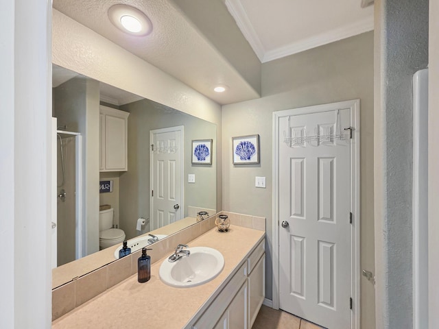 3229 Castle Dr, Crystal Beach, TX 77650 - bathroom featuring ornamental molding, toilet, a stall shower, vanity, and tile patterned floors