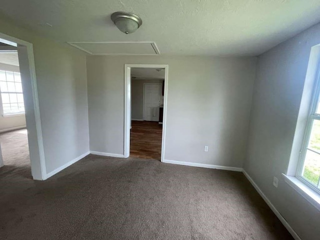 603 Willow St, Baytown, TX 77520 - unfurnished room featuring carpet and baseboards