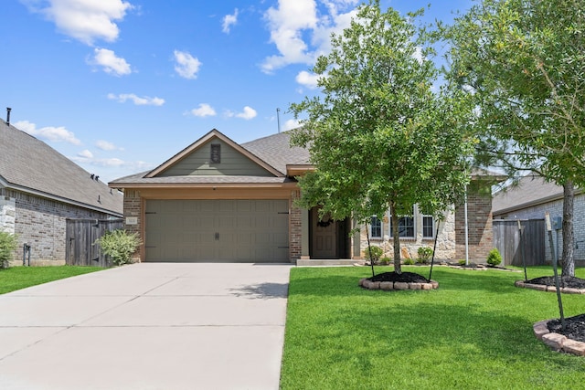 3221 Climbing Gardens Ct, Conroe, TX 77301 - view of front of home with an attached garage, driveway, and brick siding