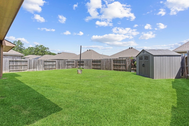 3221 Climbing Gardens Ct, Conroe, TX 77301 - view of yard with a storage shed and an outbuilding