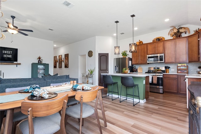 3221 Climbing Gardens Ct, Conroe, TX 77301 - dining space featuring a ceiling fan, light wood finished floors, and recessed lighting