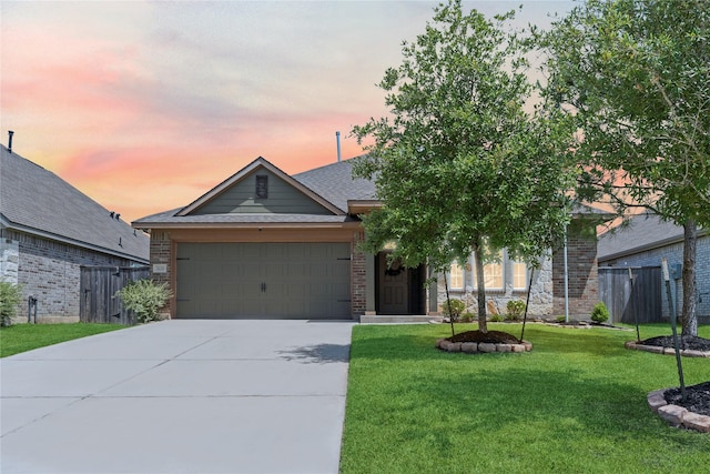 3221 Climbing Gardens Ct, Conroe, TX 77301 - view of front of property featuring an attached garage, driveway, and brick siding
