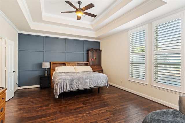 17726 Rough River Ct, Humble, TX 77346 - bedroom featuring a tray ceiling, wood finished floors, ornamental molding, and ceiling fan