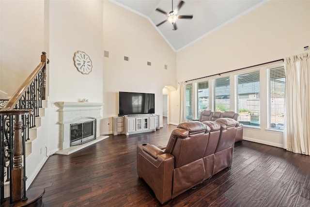17726 Rough River Ct, Humble, TX 77346 - living room with ornamental molding, high vaulted ceiling, wood-type flooring, ceiling fan, and baseboards