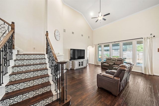 17726 Rough River Ct, Humble, TX 77346 - living area with ornamental molding, high vaulted ceiling, ceiling fan, baseboards, and arched walkways