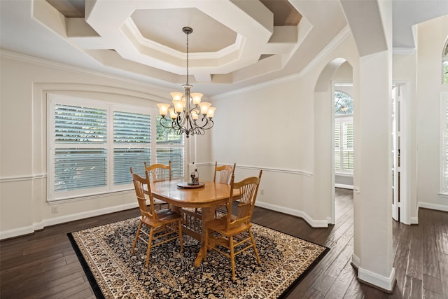 17726 Rough River Ct, Humble, TX 77346 - dining room featuring arched walkways, coffered ceiling, dark wood-style flooring, crown molding, and a chandelier