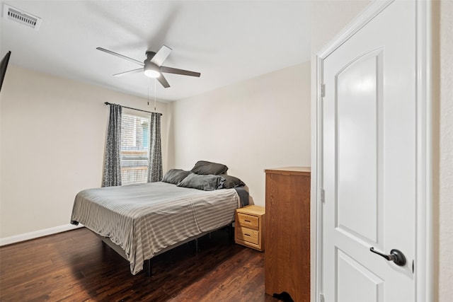 17726 Rough River Ct, Humble, TX 77346 - bedroom featuring dark wood finished floors, ceiling fan, and baseboards