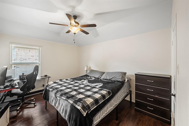 17726 Rough River Ct, Humble, TX 77346 - bedroom with dark wood-style flooring, a ceiling fan, and a desk