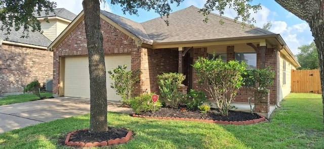 2902 Winslow Forest Ln, Houston, TX 77047 - view of front facade featuring brick siding, driveway, an attached garage, and roof with shingles