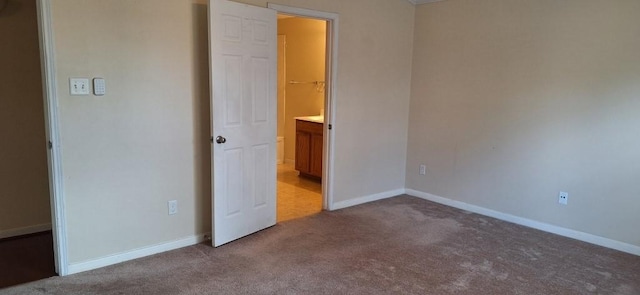 2902 Winslow Forest Ln, Houston, TX 77047 - unfurnished bedroom featuring carpet and baseboards