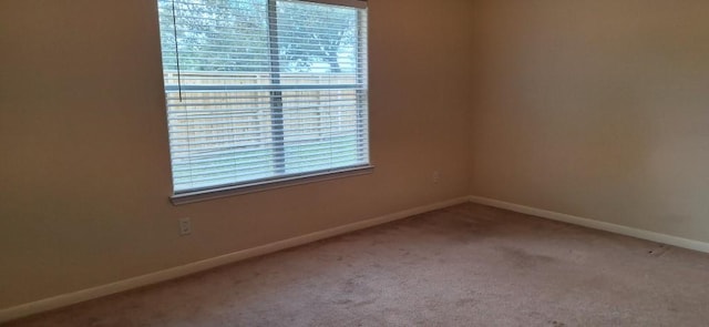 2902 Winslow Forest Ln, Houston, TX 77047 - unfurnished room with baseboards and carpet flooring