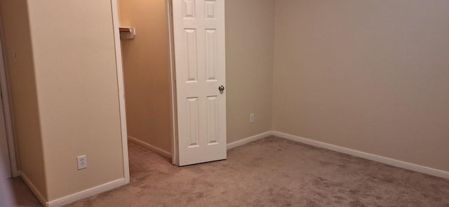 2902 Winslow Forest Ln, Houston, TX 77047 - unfurnished bedroom with carpet floors and baseboards