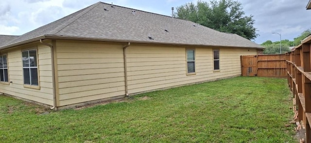 2902 Winslow Forest Ln, Houston, TX 77047 - back of house featuring a shingled roof