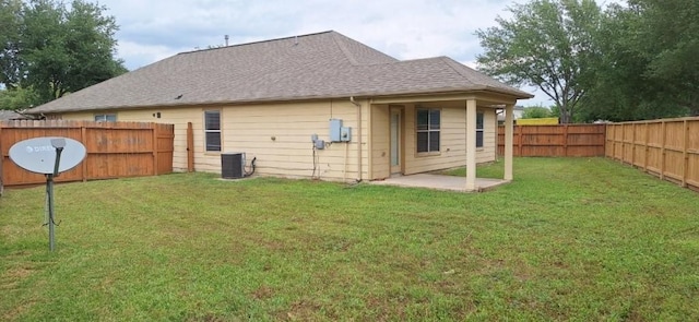 2902 Winslow Forest Ln, Houston, TX 77047 - back of house with central AC, a shingled roof, and a patio