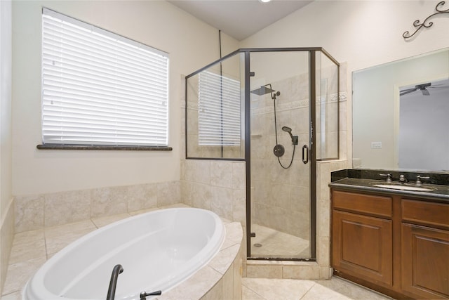 311 Gregg St, Houston, TX 77020 - full bathroom featuring a shower stall, a garden tub, vanity, and lofted ceiling