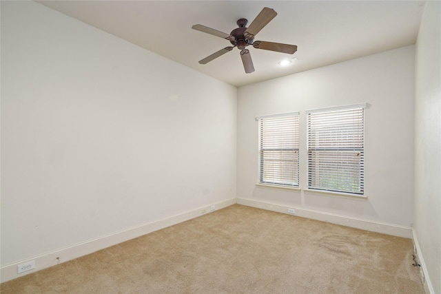 311 Gregg St, Houston, TX 77020 - spare room with light colored carpet, baseboards, a ceiling fan, and recessed lighting