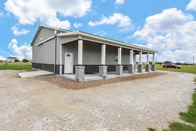263 Kingfish Ln, Palacios, TX 77465 - view of side of home with a porch