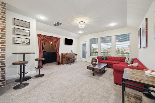 19534 Juniper Breeze Ln, Spring, TX 77379 - carpeted living room with lofted ceiling and baseboards