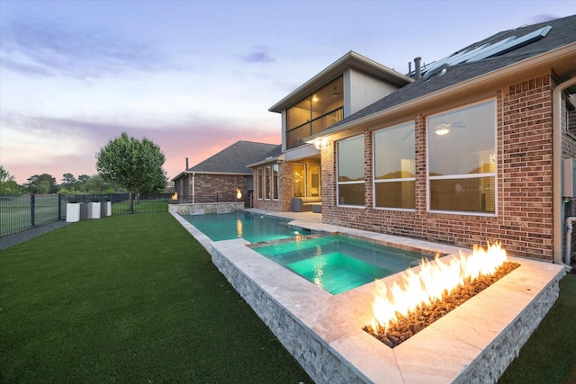 19534 Juniper Breeze Ln, Spring, TX 77379 - pool at dusk featuring a pool with connected hot tub