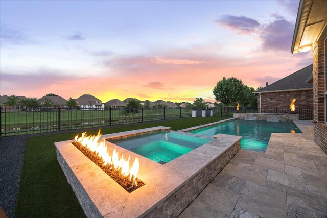 19534 Juniper Breeze Ln, Spring, TX 77379 - view of pool with an outdoor fire pit, a patio area, and a pool with connected hot tub
