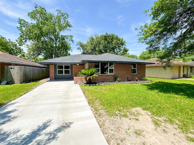 ranch-style house with driveway and brick siding