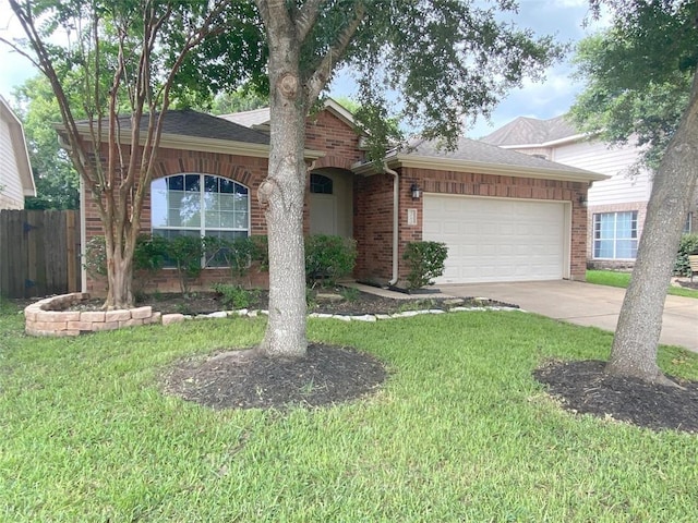 2702 Orchard Creek Ln, Katy, TX 77494 - single story home featuring an attached garage, brick siding, concrete driveway, and roof with shingles