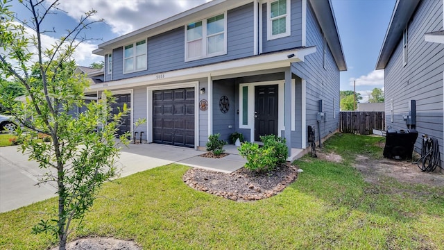 501-509 Hines Ave, Willis, TX 77378 - traditional home with a garage and driveway