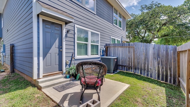 501-509 Hines Ave, Willis, TX 77378 - property entrance with central AC and a patio area