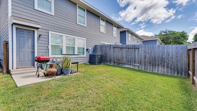 501-509 Hines Ave, Willis, TX 77378 - view of yard with central air condition unit and a patio area