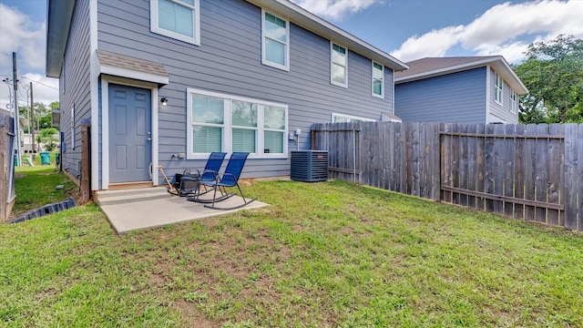 501-509 Hines Ave, Willis, TX 77378 - back of property featuring a patio area and central air condition unit