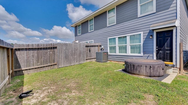 501-509 Hines Ave, Willis, TX 77378 - view of yard with a hot tub and central AC unit