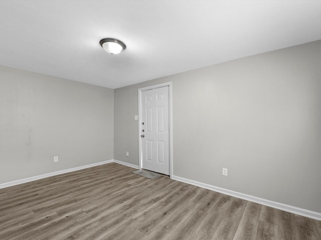 1811 39th St, Galveston, TX 77550 - spare room featuring wood finished floors and baseboards