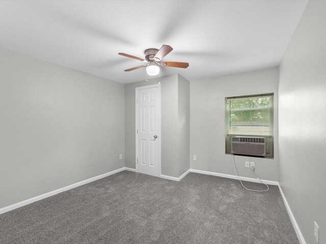 1811 39th St, Galveston, TX 77550 - unfurnished room with cooling unit, a ceiling fan, carpet floors, and baseboards