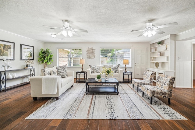 5939 Rutherglenn Dr, Houston, TX 77096 - living room featuring a ceiling fan, a textured ceiling, hardwood / wood-style floors, crown molding, and built in features