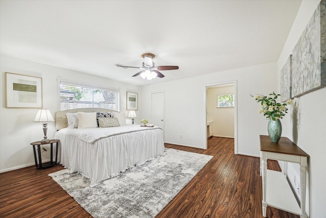 5939 Rutherglenn Dr, Houston, TX 77096 - bedroom with baseboards, dark wood finished floors, and ceiling fan