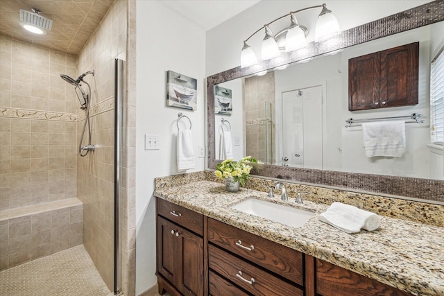 5939 Rutherglenn Dr, Houston, TX 77096 - full bathroom with a tile shower and vanity