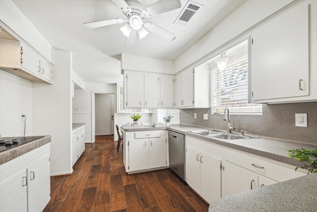 5939 Rutherglenn Dr, Houston, TX 77096 - kitchen featuring a sink, stainless steel dishwasher, dark wood finished floors, a ceiling fan, and white cabinetry
