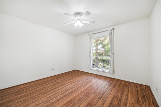 5939 Rutherglenn Dr, Houston, TX 77096 - spare room featuring wood finished floors, a ceiling fan, and baseboards