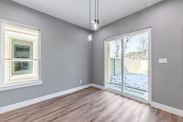 2020 Wavell St, Houston, TX 77088 - unfurnished dining area with baseboards and wood finished floors
