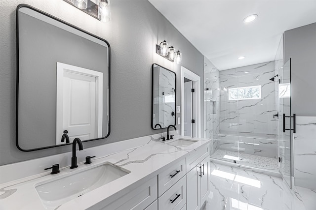 2020 Wavell St, Houston, TX 77088 - full bathroom with a marble finish shower, double vanity, marble finish flooring, and recessed lighting