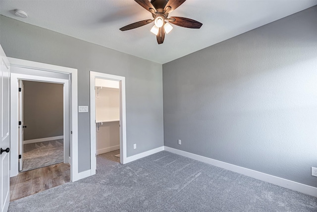 2020 Wavell St, Houston, TX 77088 - unfurnished bedroom featuring a spacious closet, carpet, baseboards, and a closet