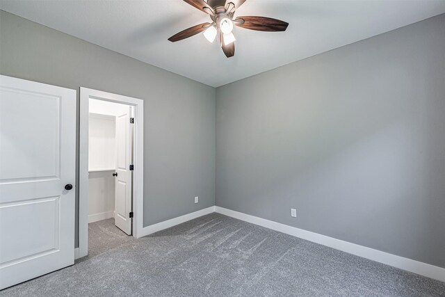 2020 Wavell St, Houston, TX 77088 - empty room featuring carpet flooring, a ceiling fan, and baseboards