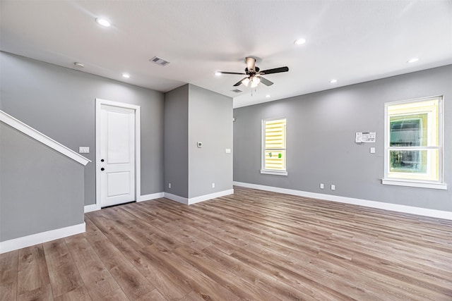 2022 Wavell St, Houston, TX 77088 - spare room featuring a ceiling fan, plenty of natural light, wood finished floors, baseboards, and recessed lighting