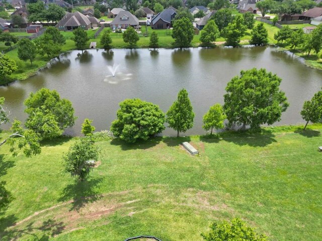 108 Madison Ave, Clute, TX 77531 - aerial view of residential area featuring a large body of water