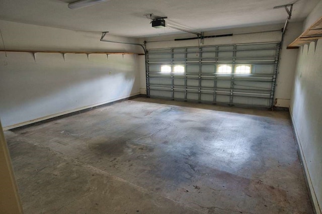 108 Madison Ave, Clute, TX 77531 - garage with a garage door opener