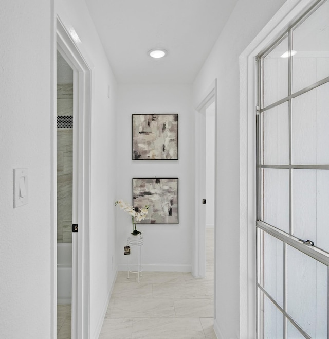 7511 Londres Dr, Houston, TX 77083 - corridor with baseboards and light marble finish floors